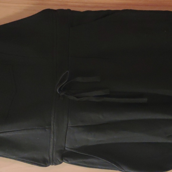 Black soft jumpsuit with back and side pockets; elastic leg bottoms - Picture 6 of 10